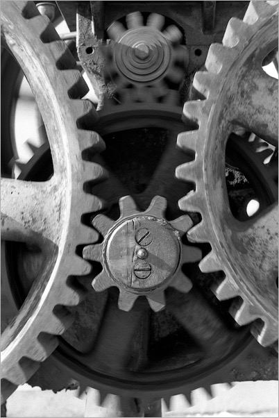 Spinning gears. By Brent 2.0. Flickr.